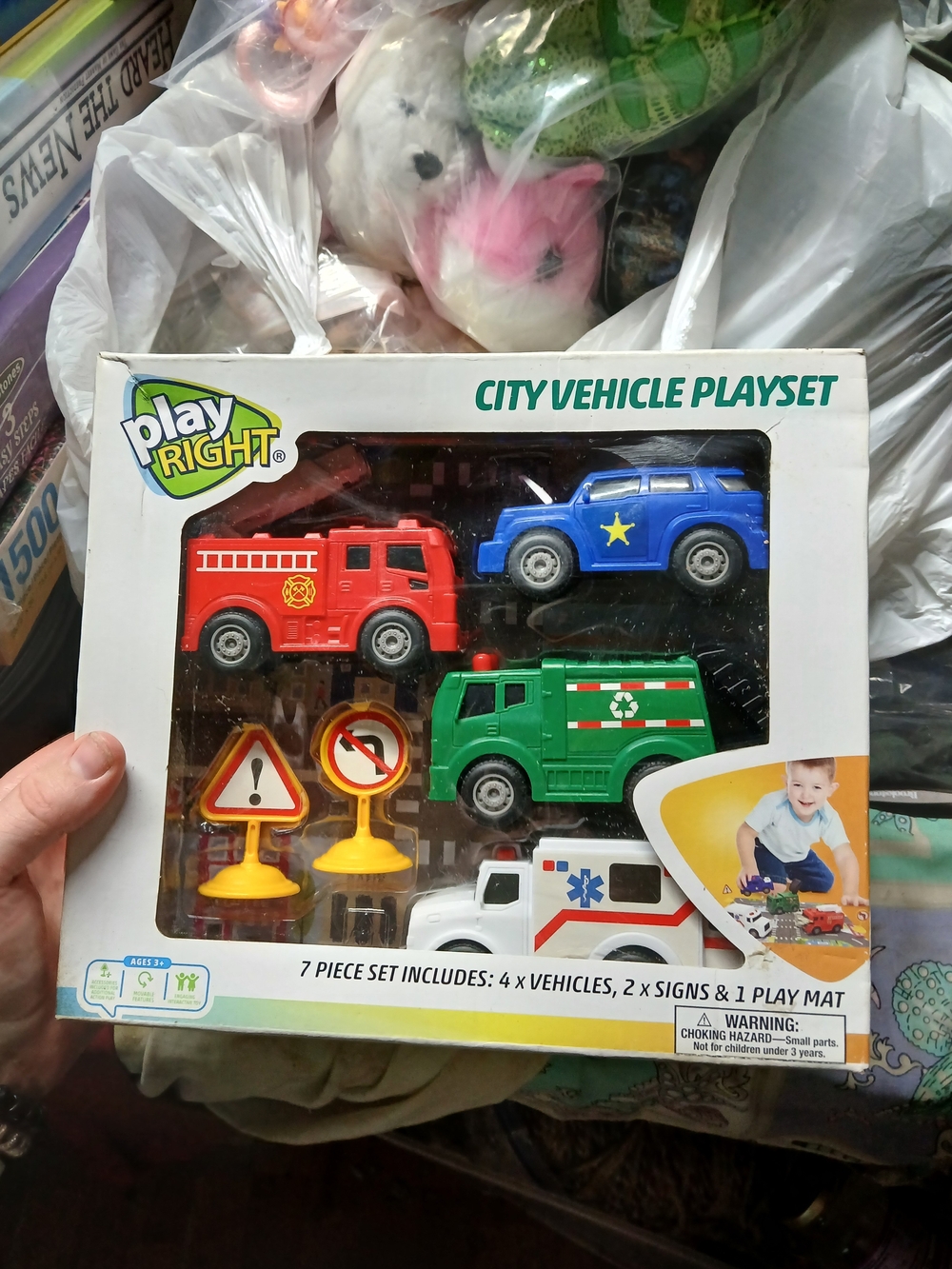 Play Right City Vehicle Playset includes four emergency vehicles, two road signs